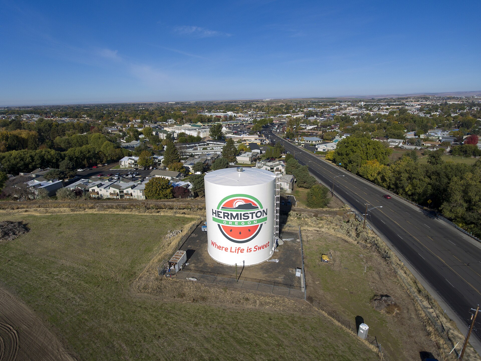 The Hermiston water tower on Highway 395 with a painted watermelon slice — a local landmark